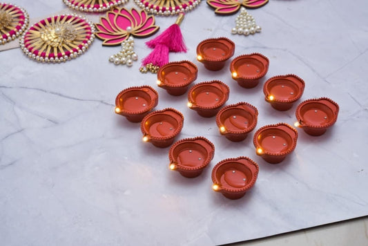 LED Water Sensor Diya Lights – Plastic Decorative Diyas with Ambient Glow (Pack of 6/12/18/24)